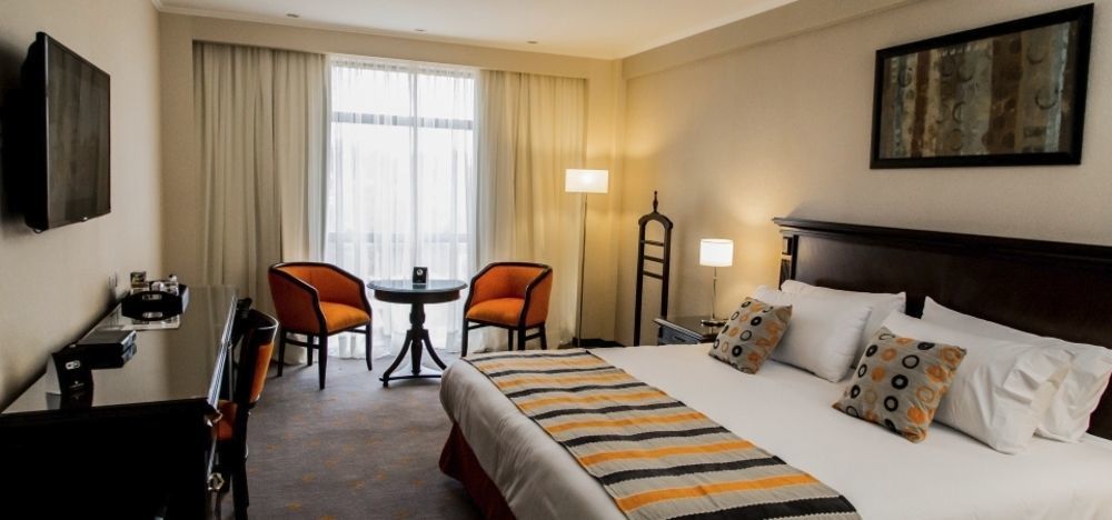 Carnaval Hotel Casino Encarnación Kültér fotó A room at the hotel