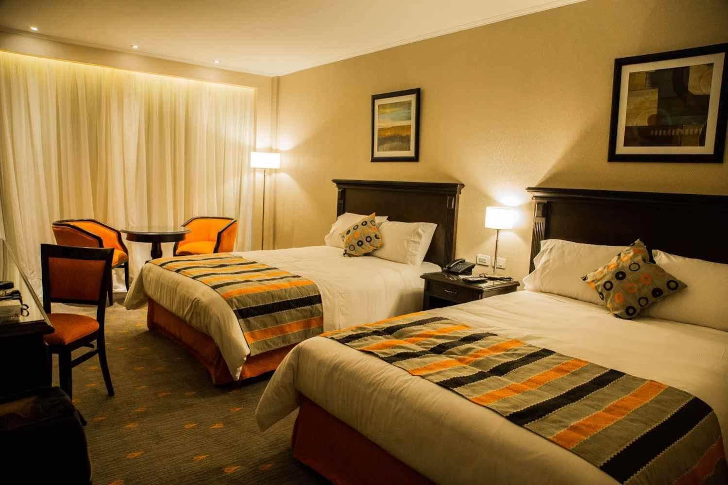Carnaval Hotel Casino Encarnación Kültér fotó A room at the hotel